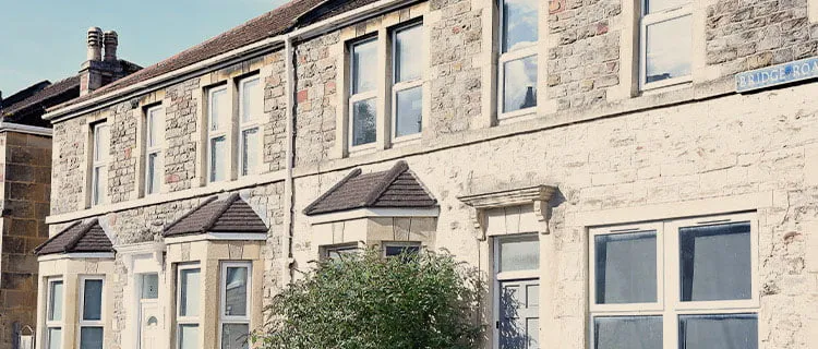 Landscape image of Bridge Road in bath showing row of terraced houses